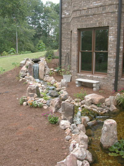 This waterfall travels 23 feet to the pond slightly downhill 